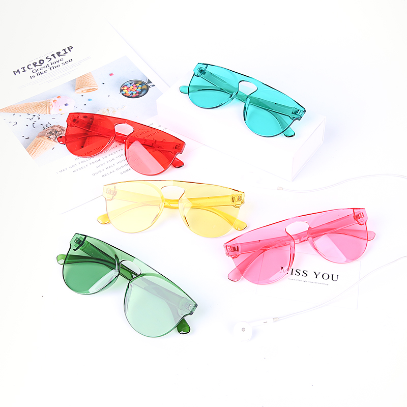 Gafas de sol redondas de caramelo europeo sin marco de una pieza de gelatina transparente de una pieza de color rosa tendencia gafas de sol LS-P1335